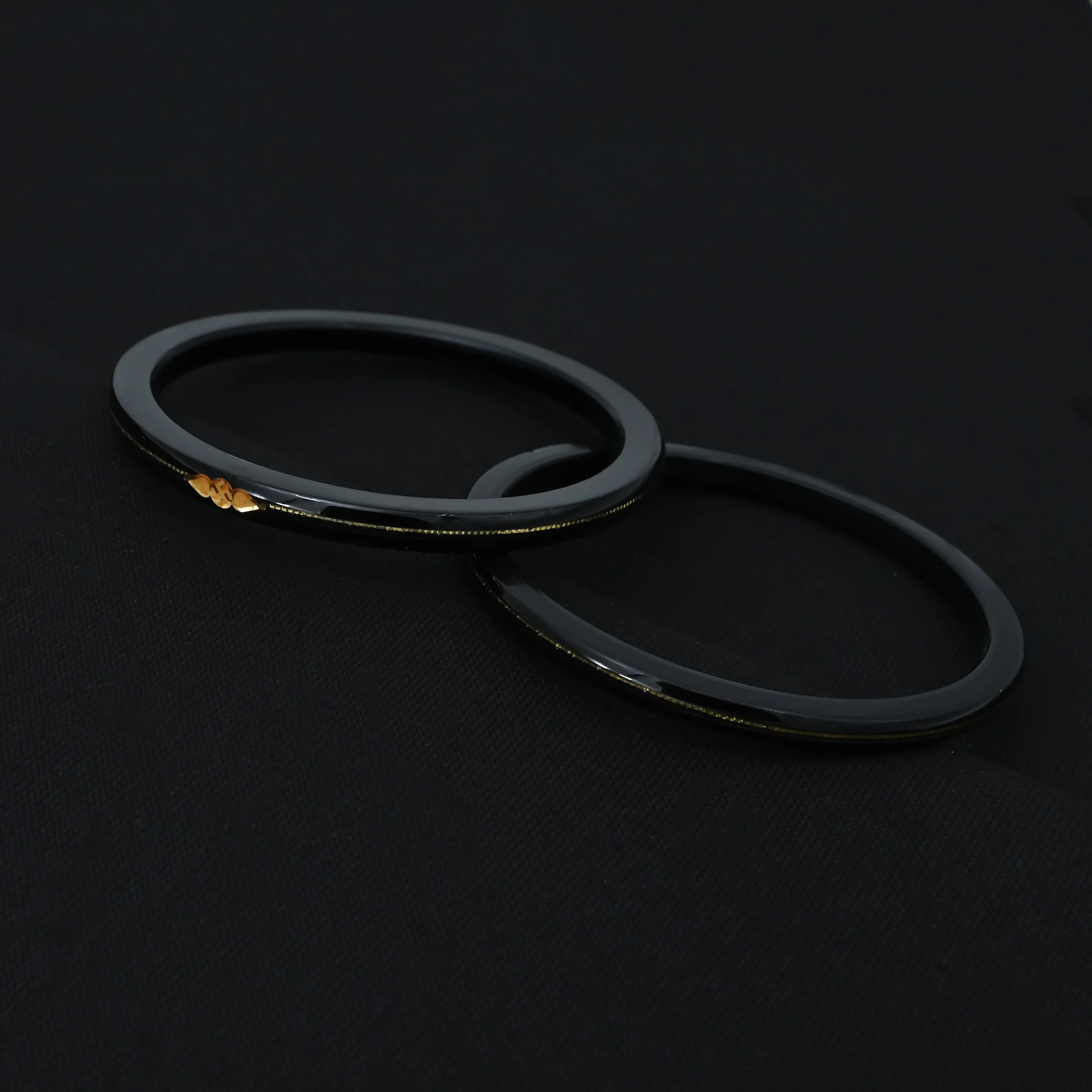 Goldr Center Swathik Design Black Bangles