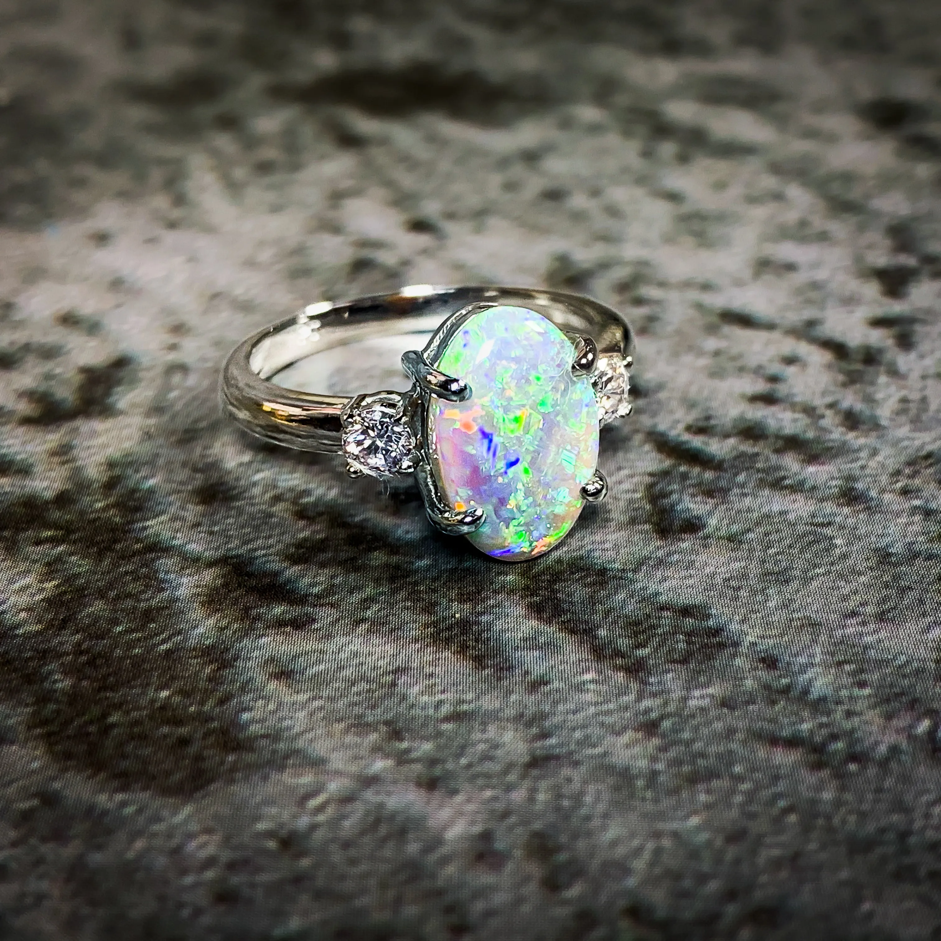 Platinum Black Opal 1.9ct and Diamond 0.24ct trilogy ring
