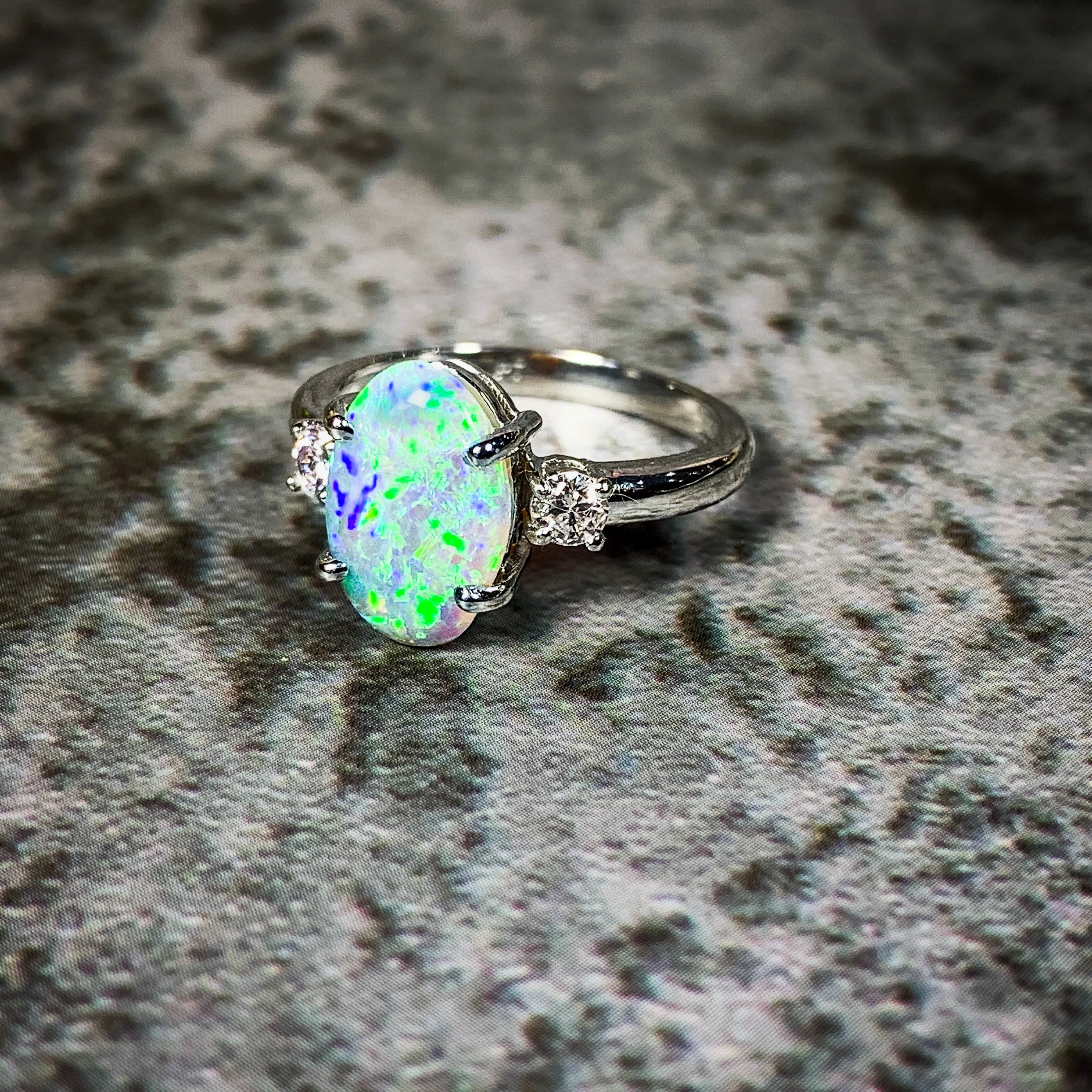 Platinum Black Opal 1.9ct and Diamond 0.24ct trilogy ring
