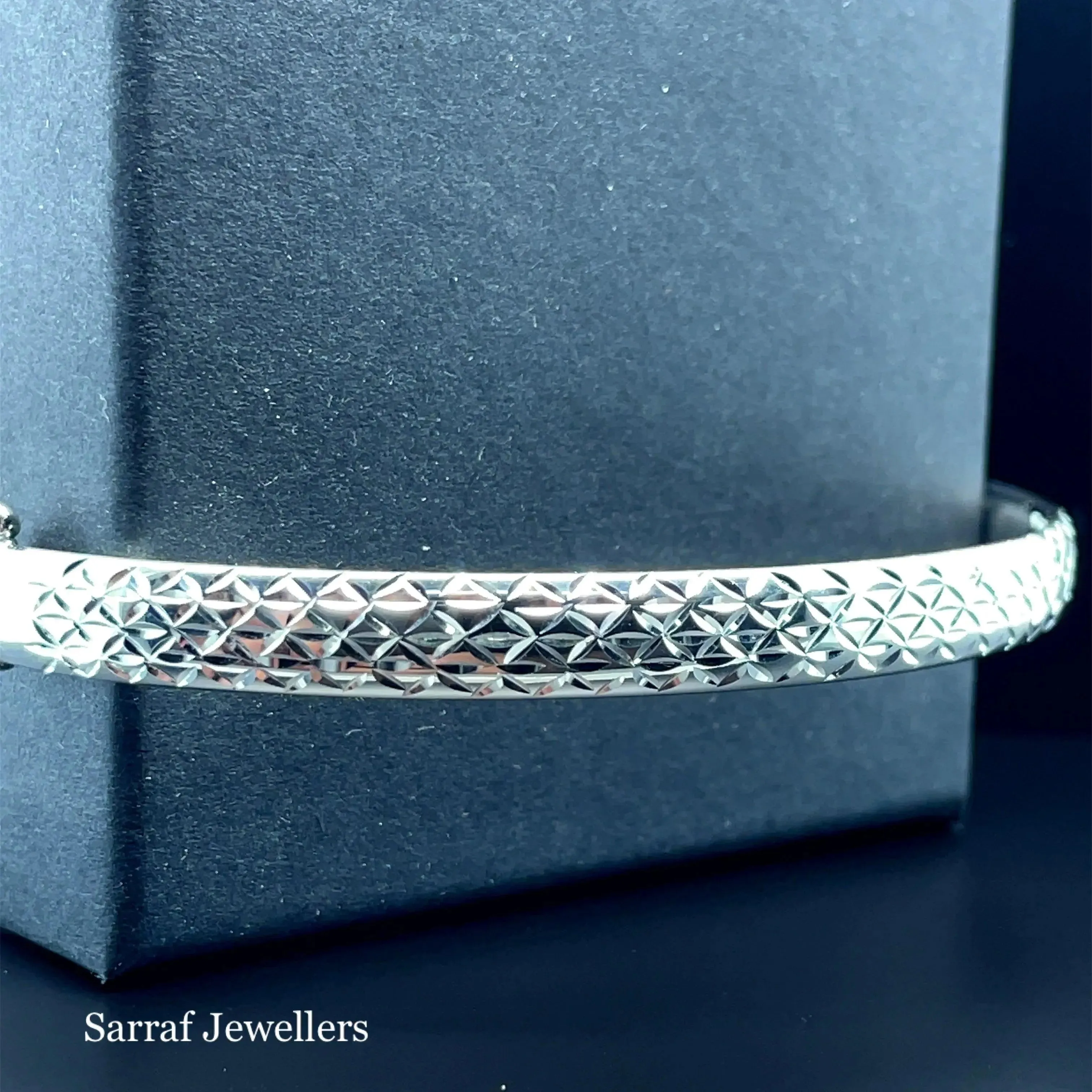 Silver Ladies Frosted Hinged Bangle Oval Diamond Cut Design | Shop Online Sarraf Jewellers UK