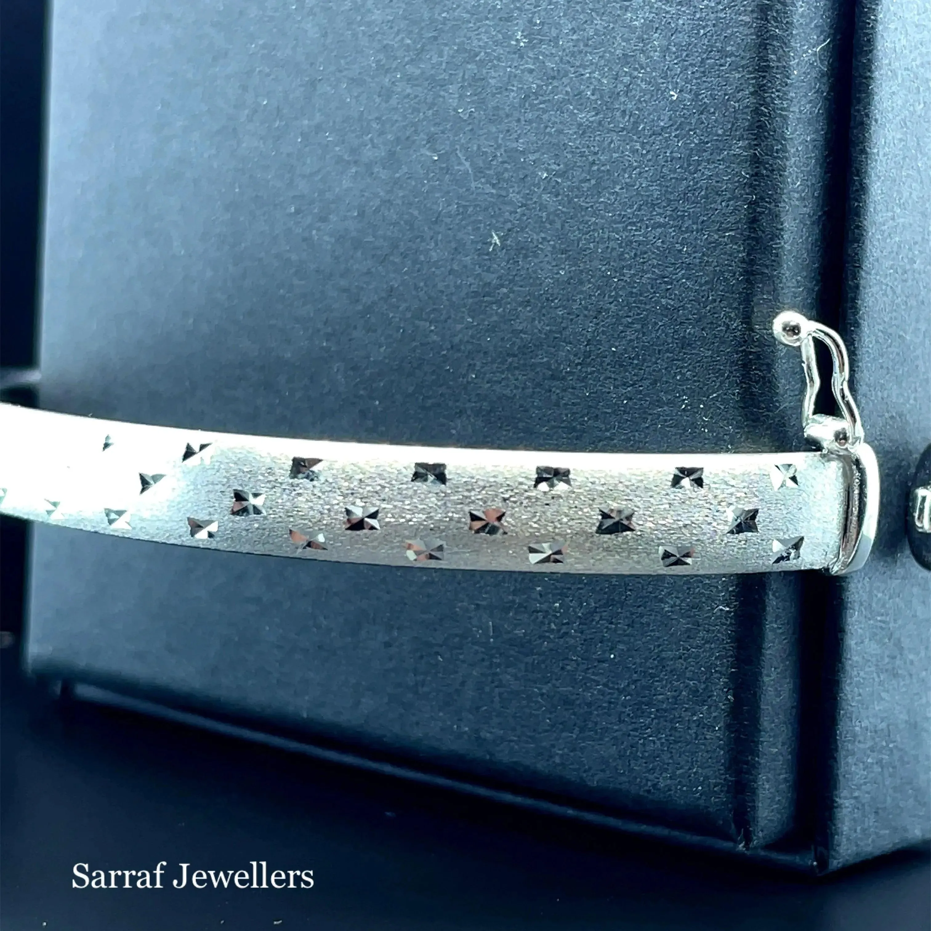 Silver Ladies Frosted Hinged Bangle Oval Diamond Cut Design | Shop Online Sarraf Jewellers UK