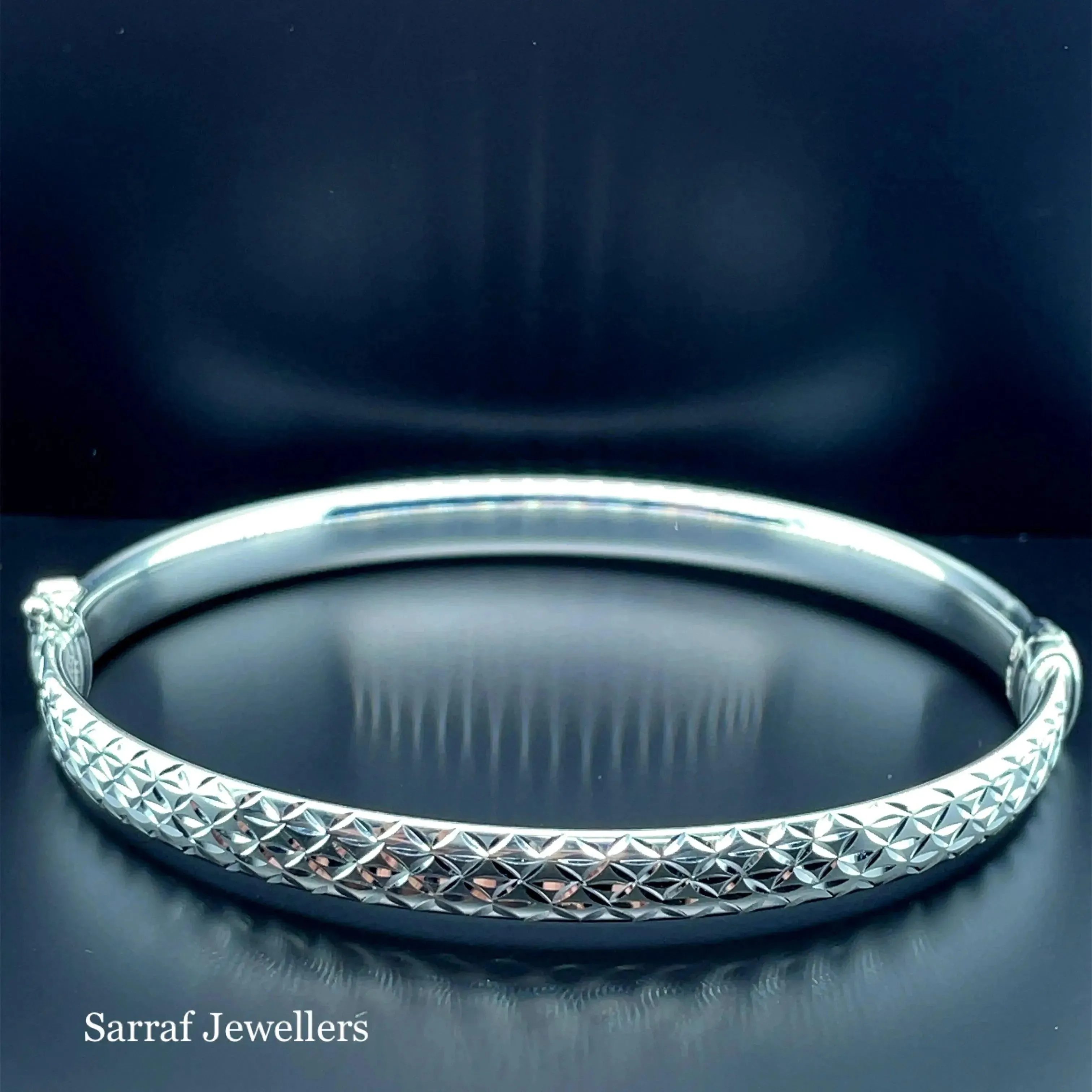Silver Ladies Frosted Hinged Bangle Oval Diamond Cut Design | Shop Online Sarraf Jewellers UK