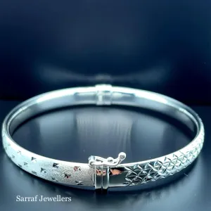 Silver Ladies Frosted Hinged Bangle Oval Diamond Cut Design | Shop Online Sarraf Jewellers UK