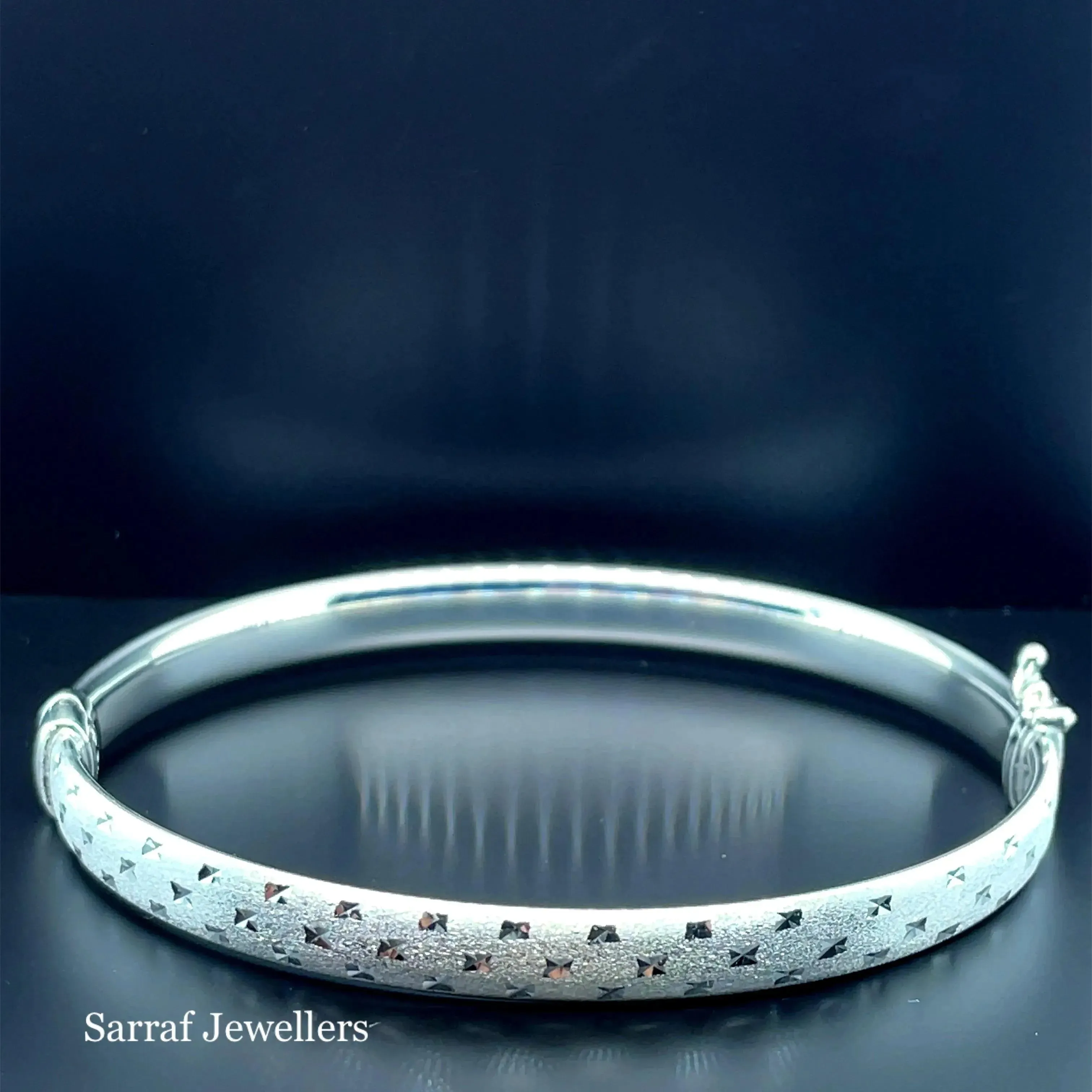 Silver Ladies Frosted Hinged Bangle Oval Diamond Cut Design | Shop Online Sarraf Jewellers UK