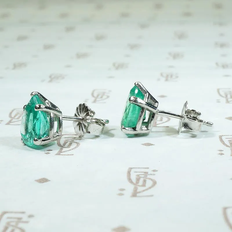 Vivacious Pear Cut Emerald Studs in Platinum