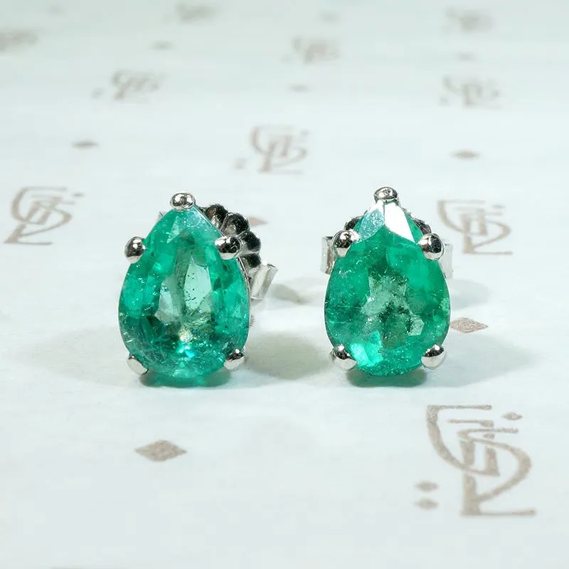 Vivacious Pear Cut Emerald Studs in Platinum
