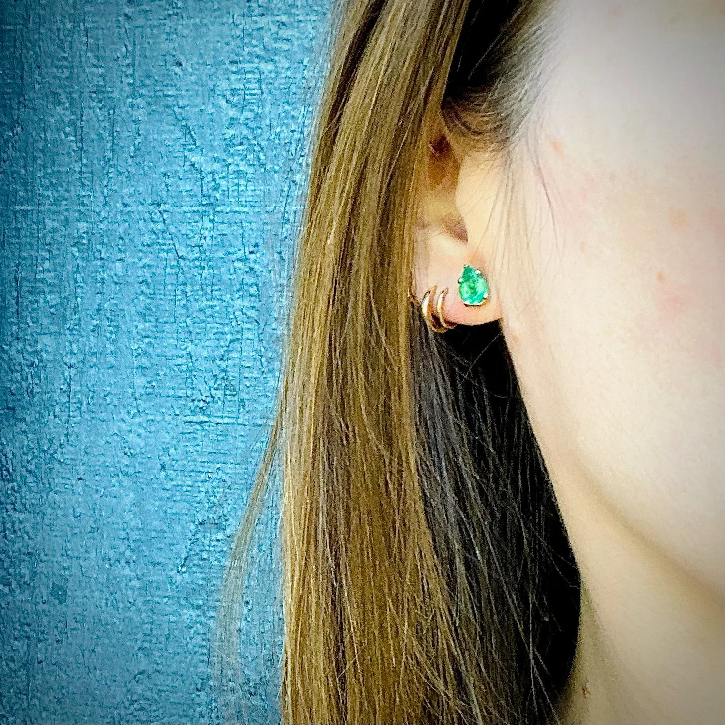 Vivacious Pear Cut Emerald Studs in Platinum