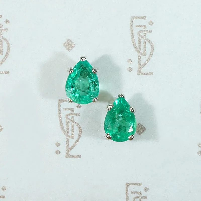 Vivacious Pear Cut Emerald Studs in Platinum