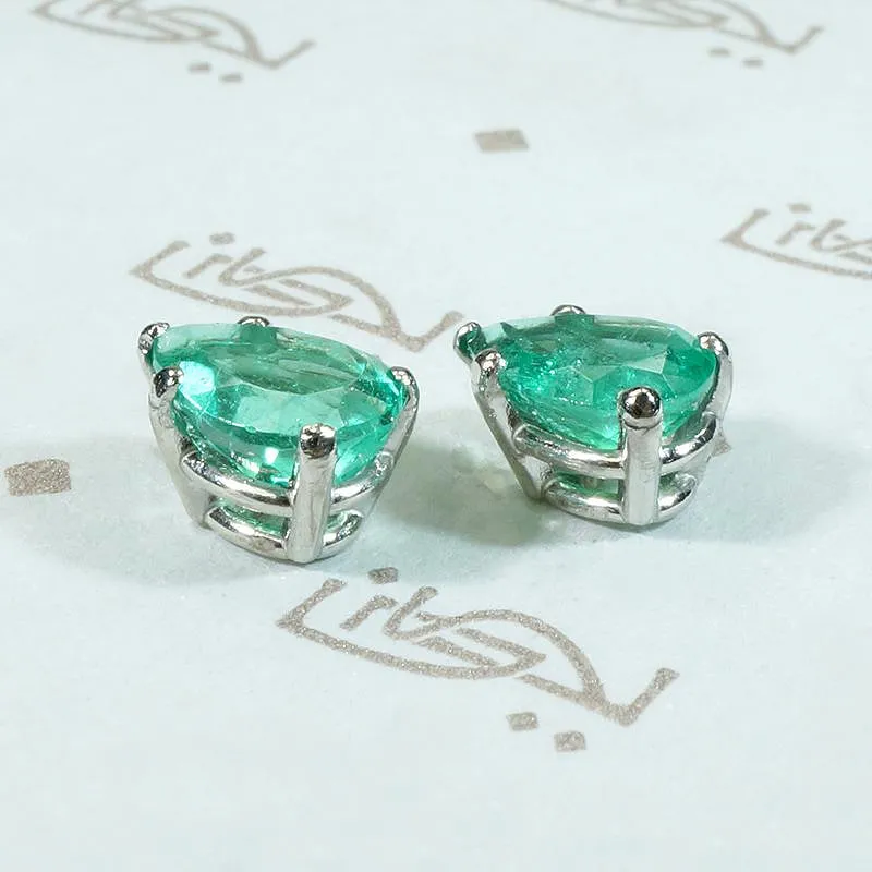 Vivacious Pear Cut Emerald Studs in Platinum